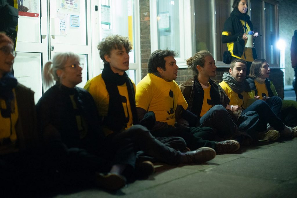 Activists from Na’amod: British Jews against Occupation blocking entrance to a talk by Naomi Linder Kahn, director of the international division of the Israeli NGO Regavim, hosted by UK Lawyers for Israel in north London. Dec. 1, 2019. (Photo: Tash Lever)