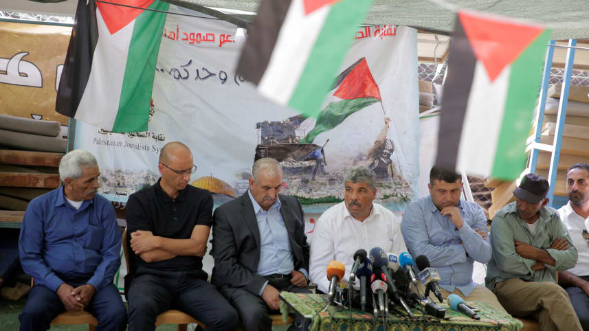 Residents of Khan al-Ahmar at a press conference in September, after the High Court turned down their appeal against evacuation of their village.Credit: Olivier Fitoussi