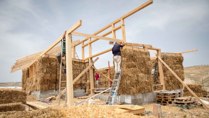 The straw and mud brick structure on a hill near the West Bank village of Khan al-Ahmar Boaz Ido is funding, April, 2019. Credit: Emil Salman