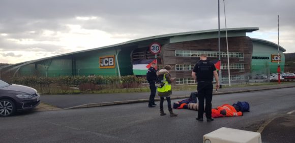 Manchester Action Palestine protesters lock arms outside of JCB World Logistic, Lowlands Rd, Stoke-on-Trent, Thursday, March 7, 2019. (Photo: Manchester Action Palestine)