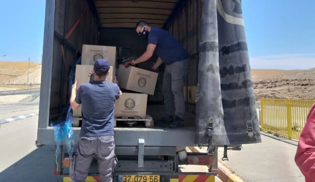 Food distribution in the isolated villages, on Thursday, April 30, 2020.Credit: Yael Moav